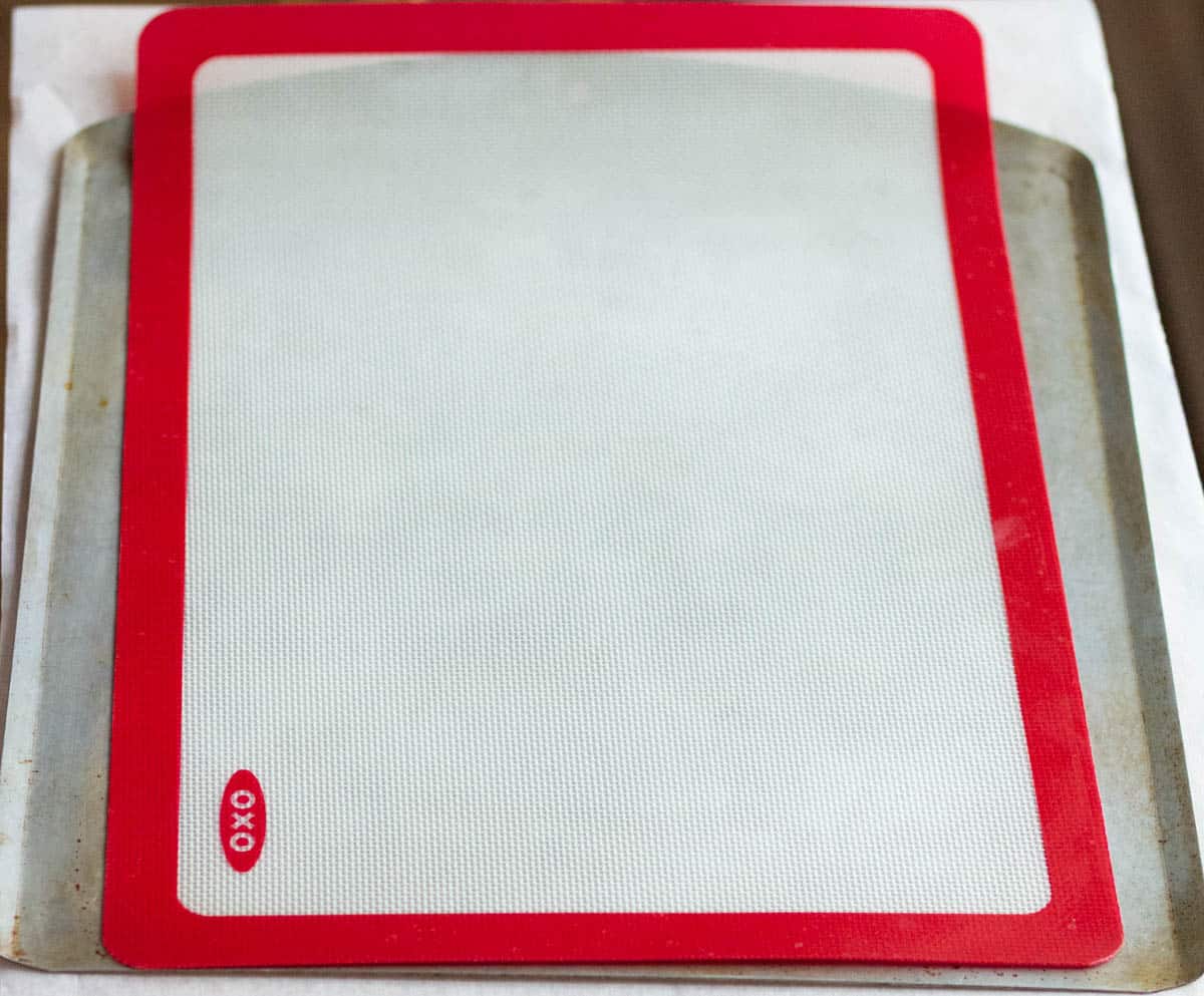 A baking sheet lined with a Silpat