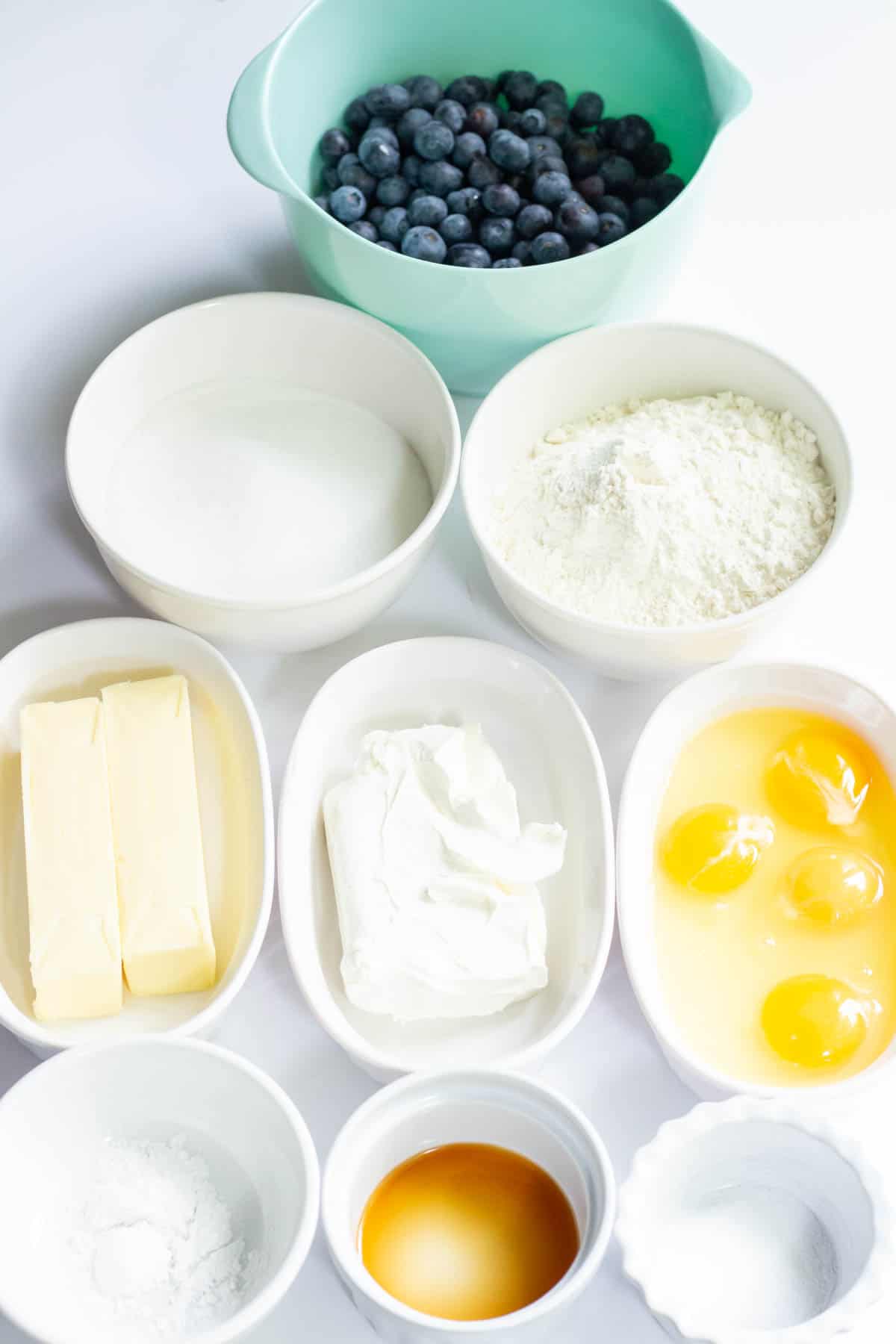 The Best Blueberry Cream Cheese Muffins | thewendthousekitchen.com Ingredients for the muffins in separate small bowls