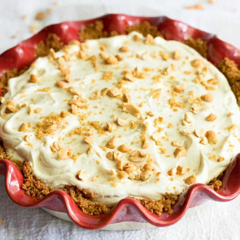 Peanut butter pie in a red pie plate
