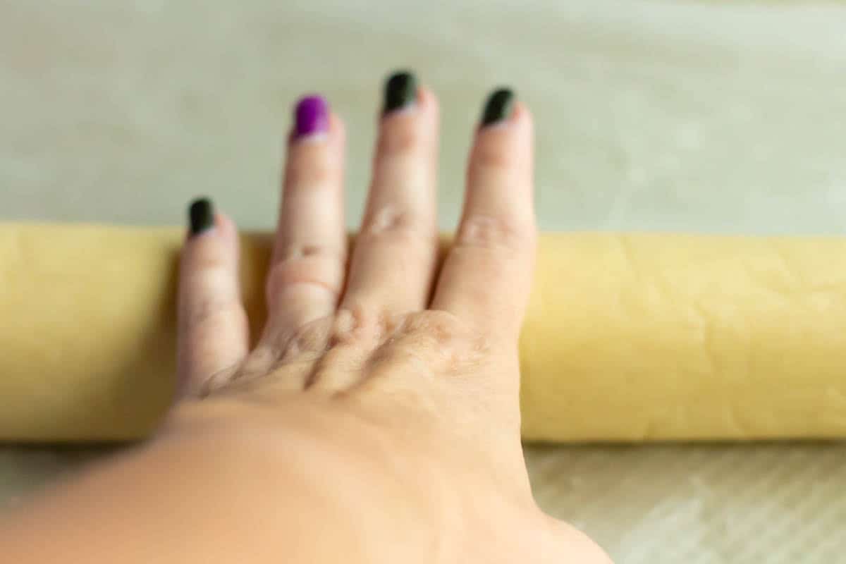 Old-Fashioned Butter Cookie Recipe | thewendthousekitchen.com Rolling dough into a log.