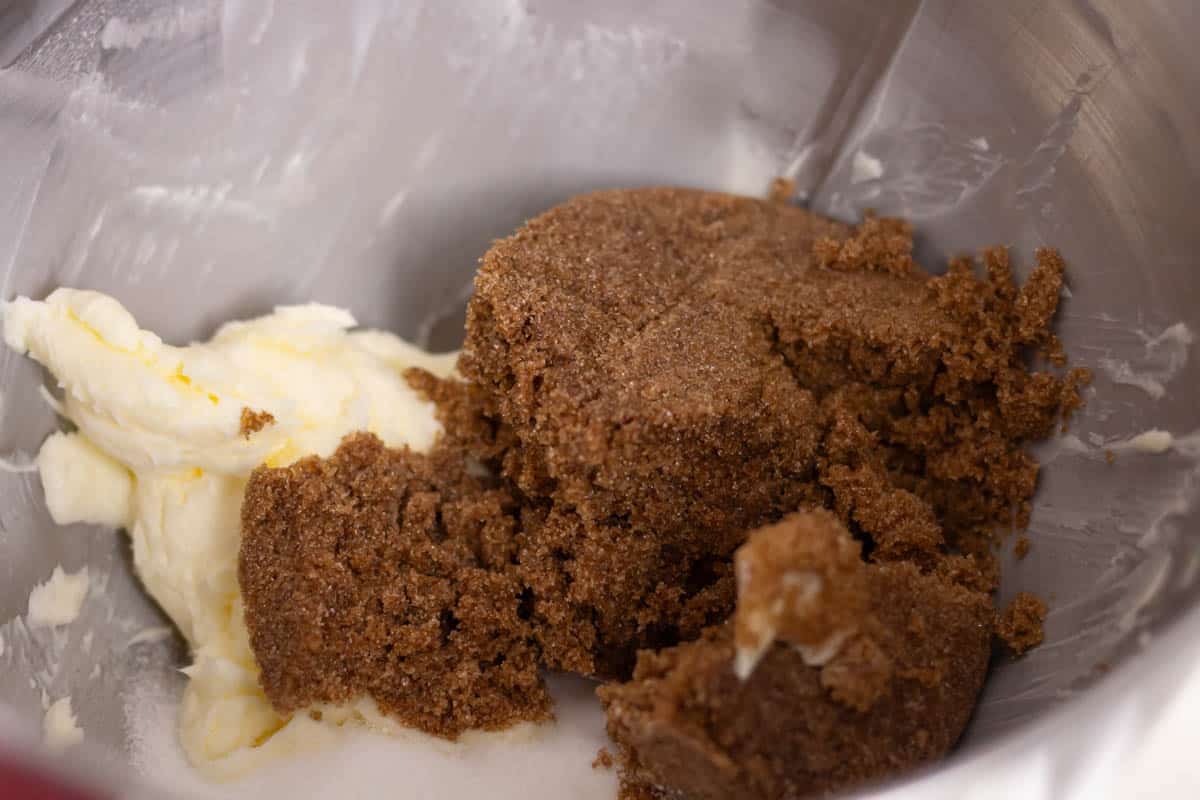 Sugar, brown sugar and whipped butter in the bowl of a stand mixer