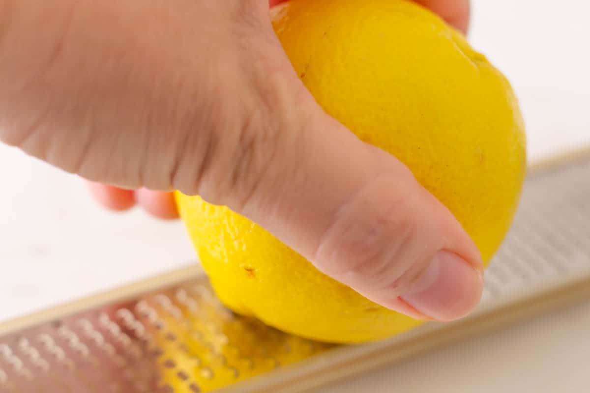 Zesting a lemon on a zester