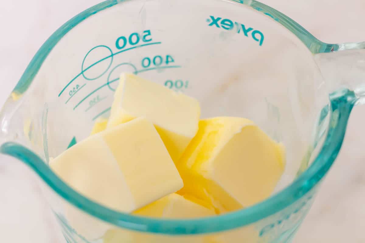 Carmelitas Dessert Bars | thewendthousekitchen.com Butter in a glass measuring cup