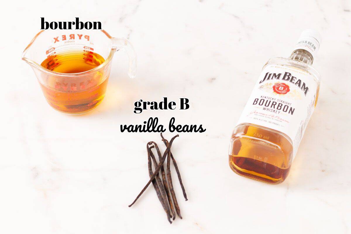 Easy Bourbon Vanilla Extract | thewendthousekitchen.com Ingredients to make bourbon vanilla extract and labeled.
