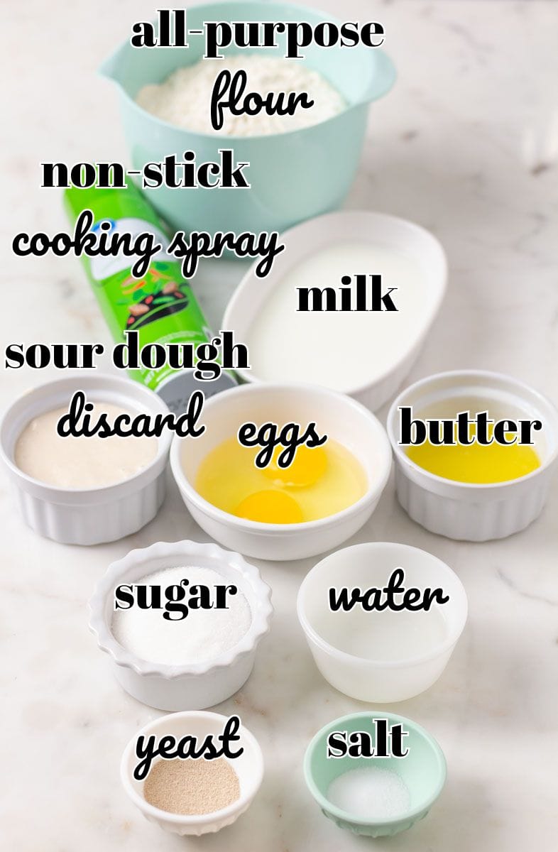 Sour Dough Discard Cinnamon Rolls | thewendthousekitchen.com Labeled ingredients for cinnamon rolls in individual bowls.