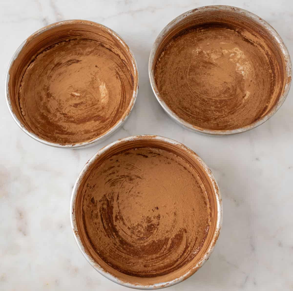 Chocolate Mint Cake with Mint Cream Cheese Frosting | thewendthousekitchen.com Three round 8-inch cake pans greased and dusted with cocoa.