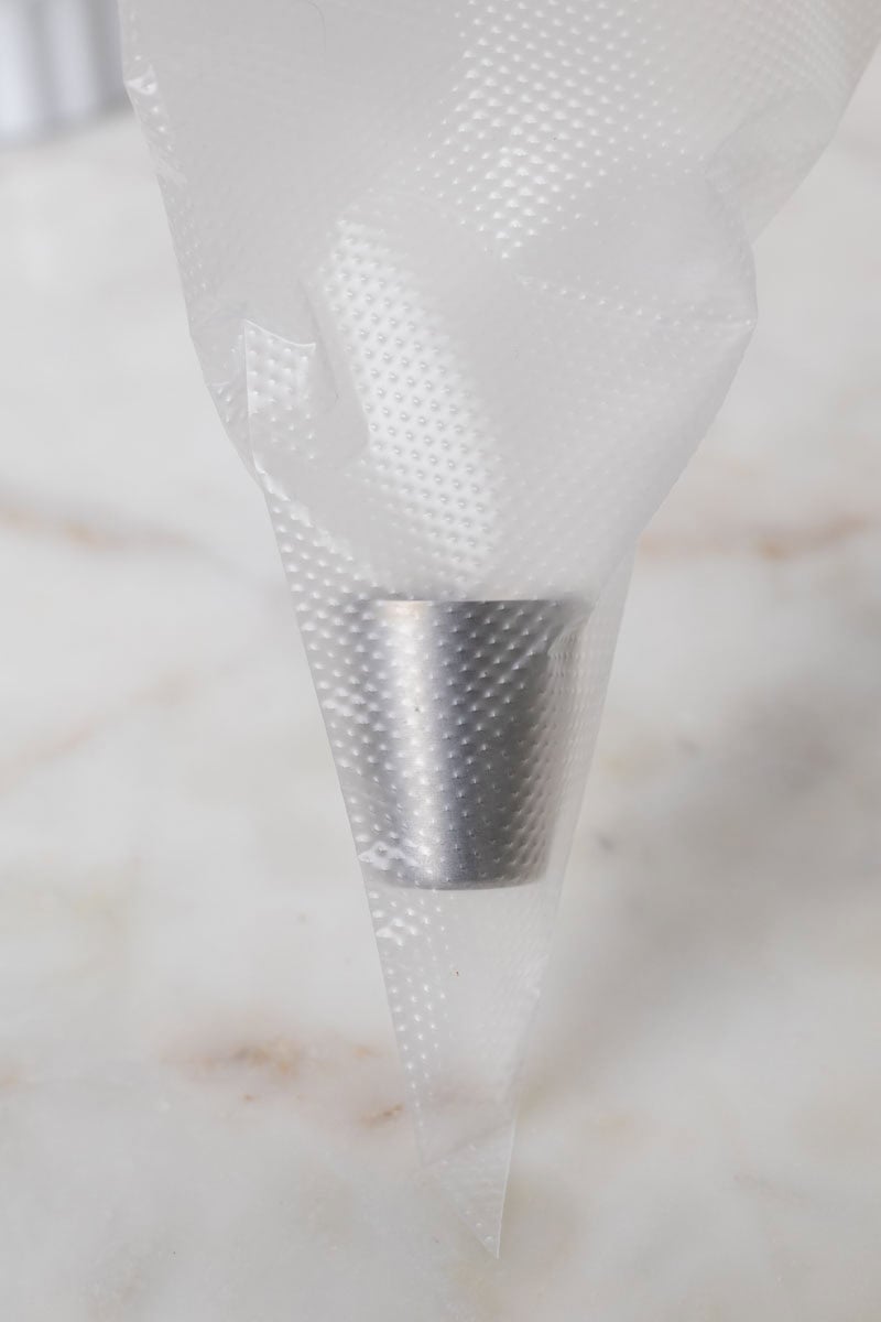 Bunny Cupcakes for Easter (Bunny Butt Cupcakes) | thewendthousekitchen.com Russian piping tip inside of a 16-inch piping bag.
