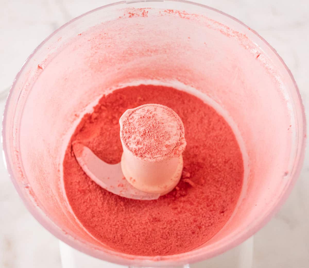 Strawberry Crunch Cake | thewendthousekitchen.com Freezed-dried strawberries ground into a fine powder inside of a food processor.